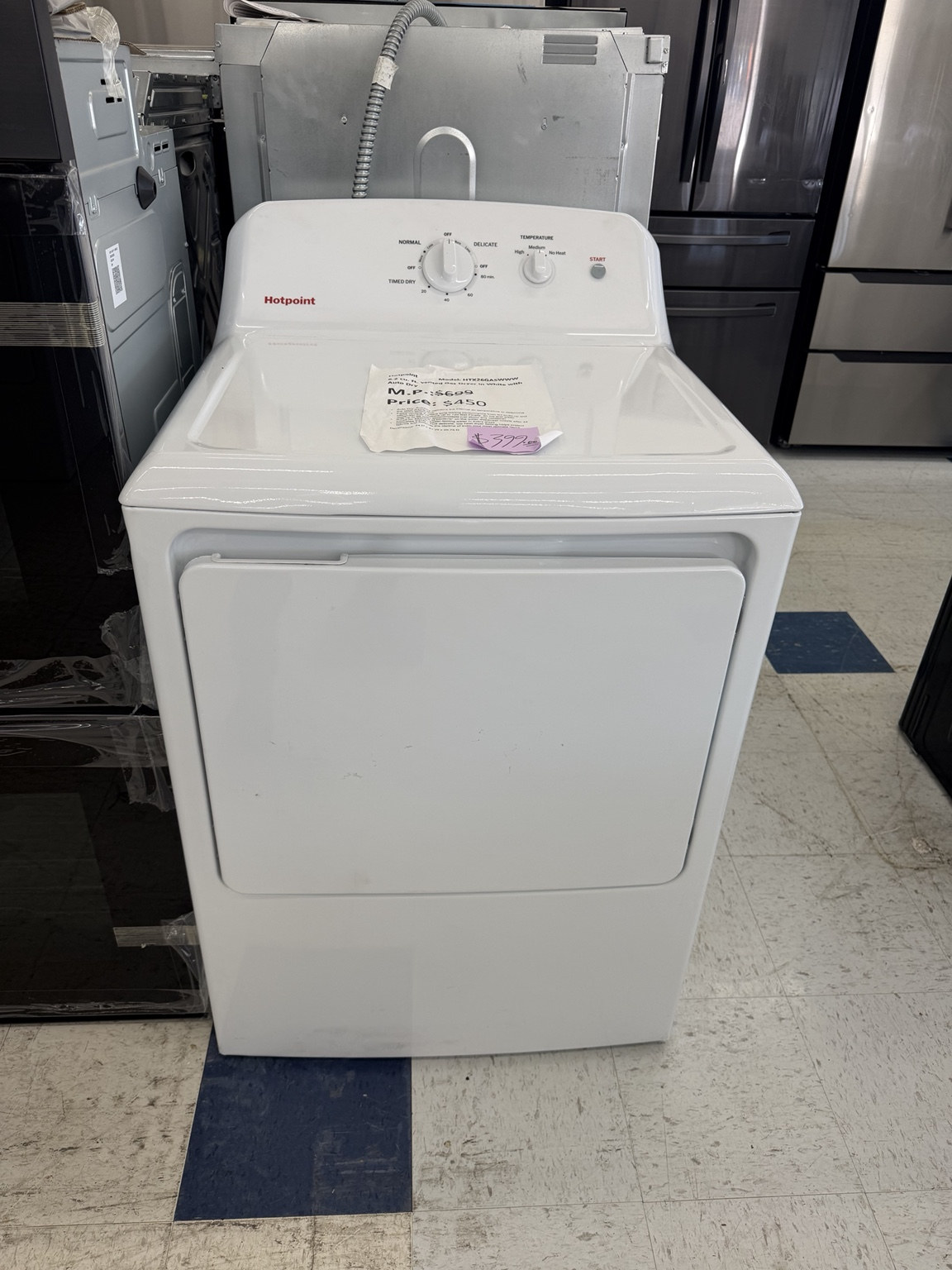 Actual Hotpoint HTX26GASWWW 6.2 Cu. Ft. Gas Dryer with Auto Dry in White in the MD Appliances showroom
