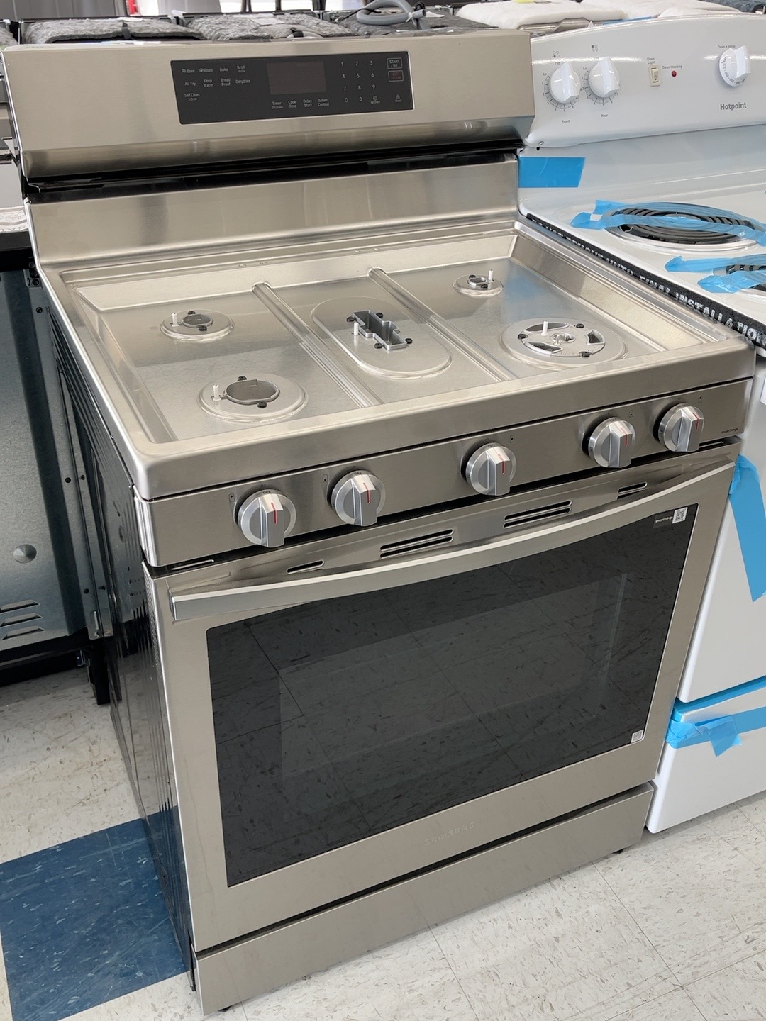 Actual Samsung NX60A6711SS 30 in. 5-Burner Smart Gas Range with Air Fry in the MD Appliances showroom