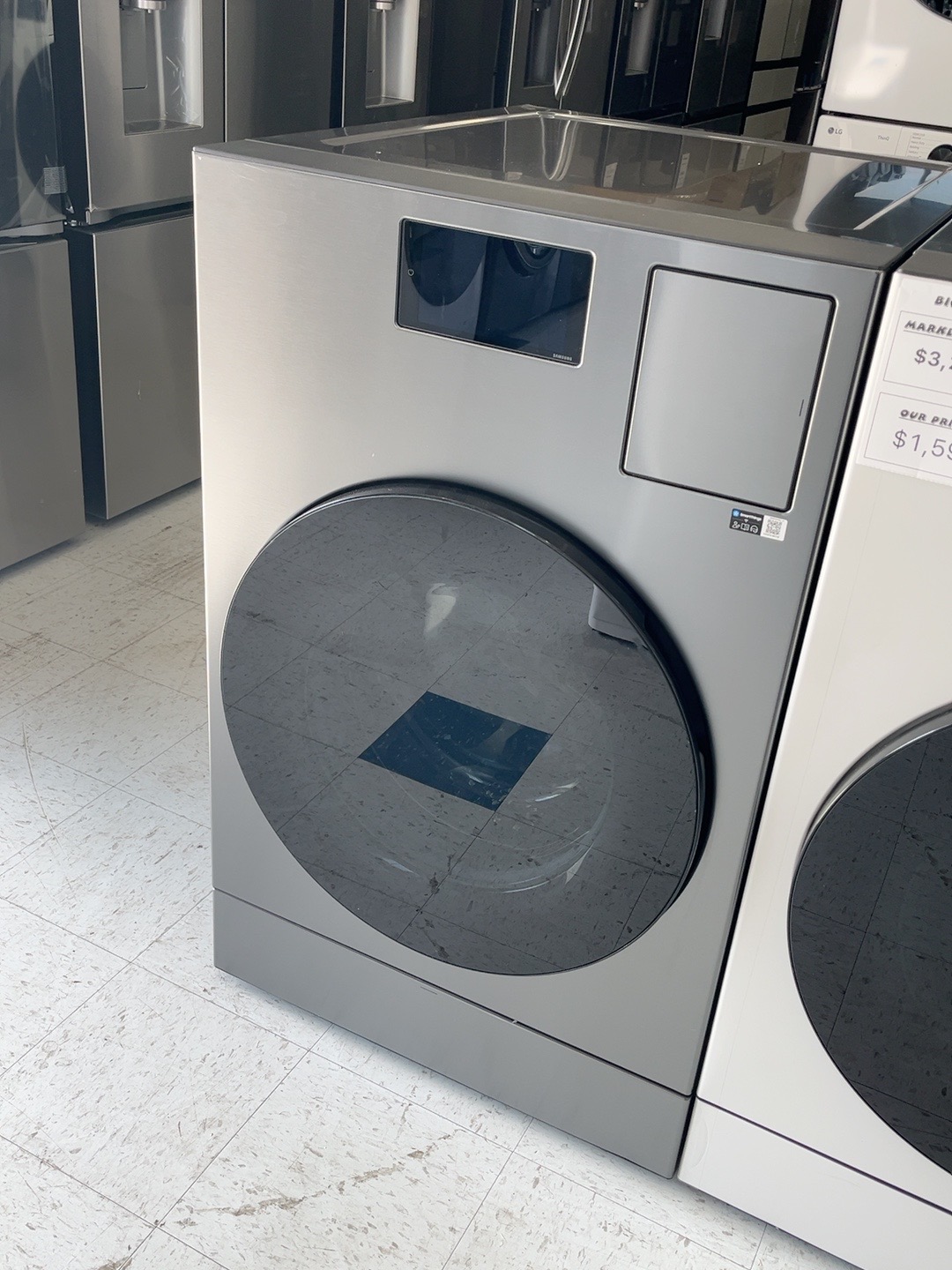 Actual Samsung WD90F53AVS 5.3 Cu. Ft. Bespoke AI Vented All-in-One Washer Dryer Combo in Dark Steel in the MD Appliances showroom