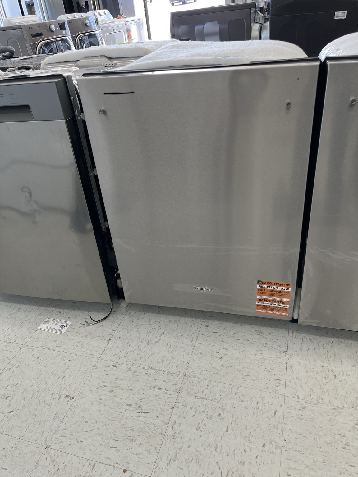 Actual Whirlpool 24-Inch Top Control Dishwasher with Third Rack in Fingerprint Resistant Stainless Steel — Unit 1 – Model WDT750SAKZ4 in the MD Appliances showroom
