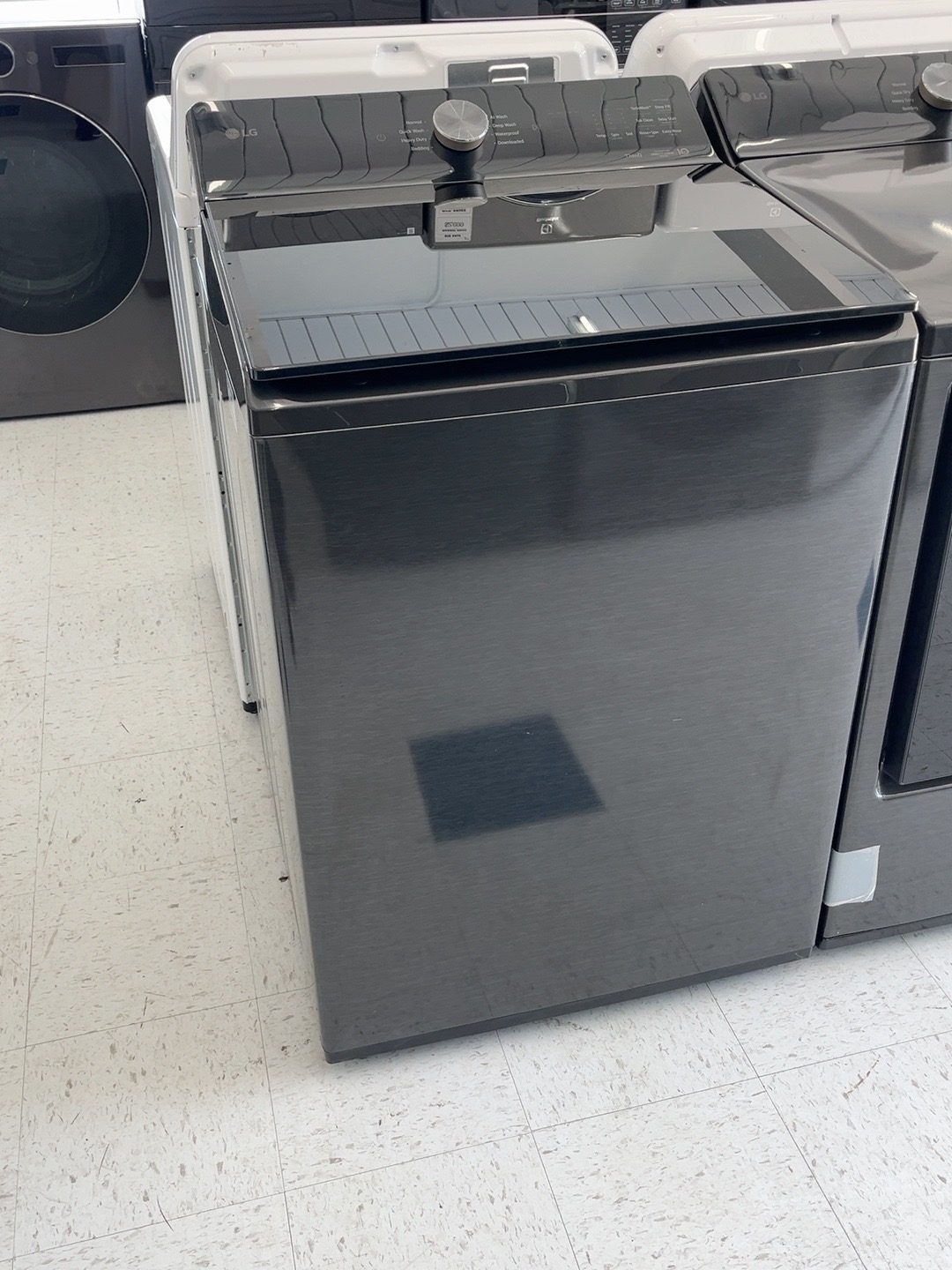 Actual LG WT8480CL 5.5 Cu. Ft. Mega Capacity Smart Top Load Washer in Platinum Black in the MD Appliances showroom