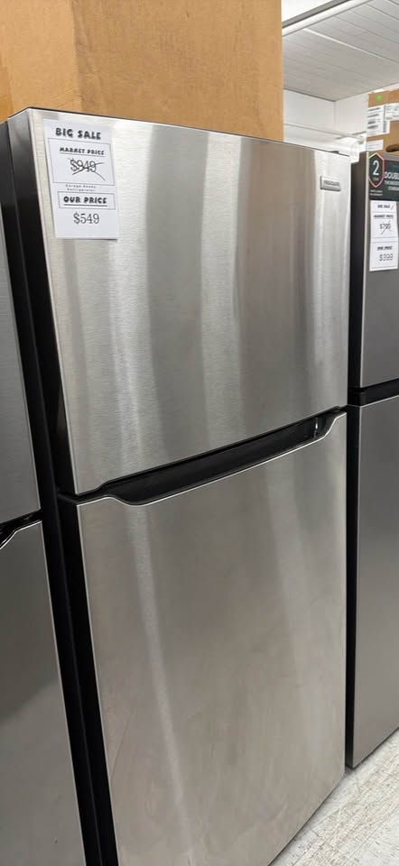 Actual Frigidaire 20-cu ft Standard-Depth 30-in Wide Top-Freezer Refrigerator ( Stainless Steel ) Garage Ready ENERGY STAR Certified – Model FFHT2045XS in the MD Appliances showroom