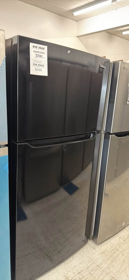 Actual Frigidaire 18.3-cu ft Standard-Depth 30-in Wide Top-Freezer Refrigerator ( Black ) Garage Ready – Model FFTR1835VB in the MD Appliances showroom