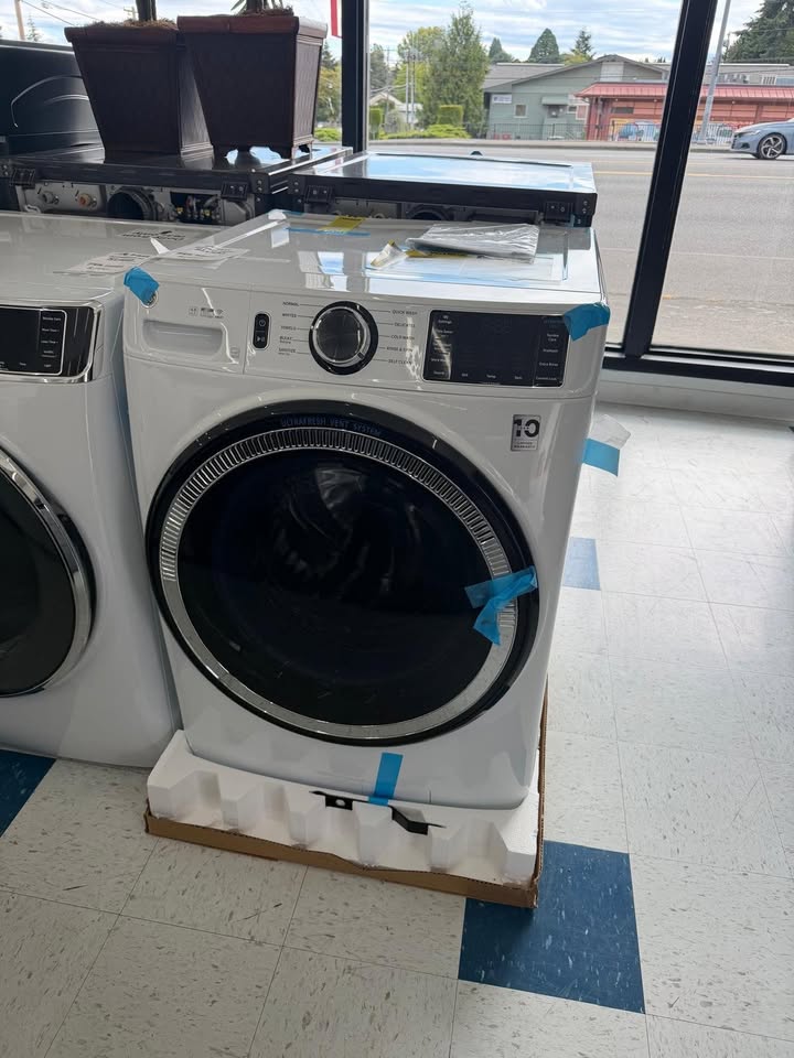 Actual GE 4.8 cu. ft. Smart White Front Load Washer with OdorBlock UltraFresh Vent System and Sanitize – Model GFW550SSNWW in the MD Appliances showroom